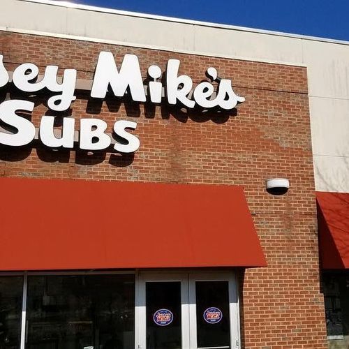A doorway awning in front of a Jersey Mike's Subs location