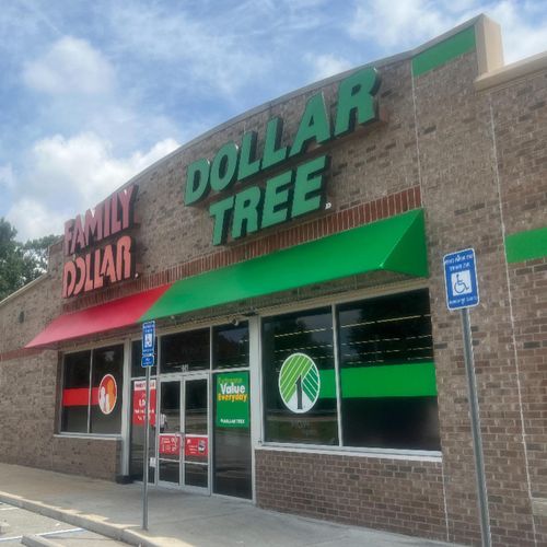 Standard awnings cover the entrance to a Family Dollar / Dollar Tree building