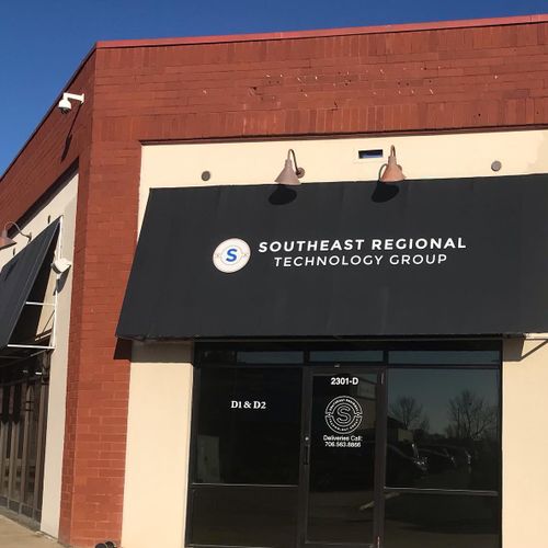 A storefront awning for the Southeast Regional Technology Group building in Columbus, GA